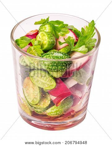 Glass of cucamelon and radish salad isolated