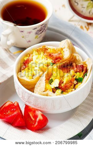 Breackfast omelette pita with tomato ..selective focus