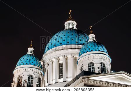Night View Domes With Stars Of The Troitsky Cathedral In Saint-petersburg.
