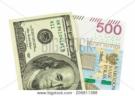 Banknotes of 100 USD and 500 PLN isolated on white background with clipping path