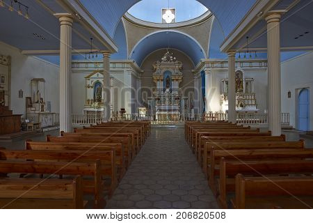 Pica, Tarapaca, Chile - August 28, 2017: Interior of the historic church of San Andres in the village of Pica in the Atacama Desert, Tarapaca, Chile.