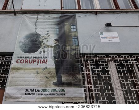 MEDIAS ROMANIA - SEPTEMBER 22 2017: Anti Corruption poster displayed on a police station wall in Medias Transylvania. Romania is considered to be one of the most corrupt countries of the European Union