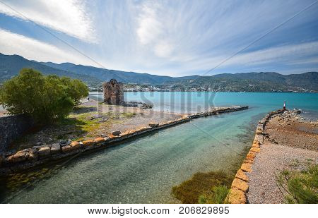 Old windmills near famous summer resort Elounda, Eastern Crete, Greece