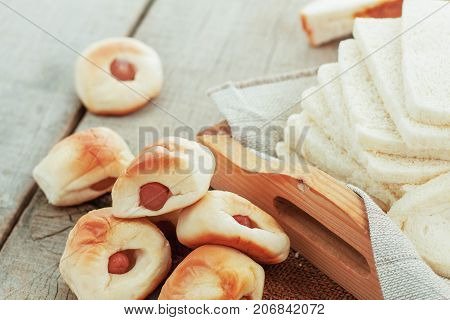 Baked Bread And More On Wooden Floor.