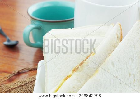 Ham Bread And Coffee Cup On Wooden Table.