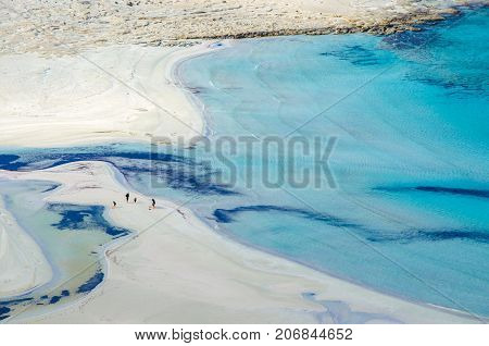 Amazing view of Balos Lagoon with magical turquoise waters, lagoons, tropical beaches of pure white sand and Gramvousa island on Crete, Greece
