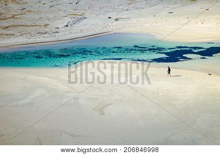Amazing view of Balos Lagoon with magical turquoise waters, lagoons, tropical beaches of pure white sand and Gramvousa island on Crete, Greece