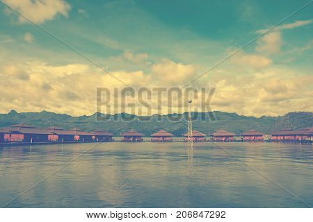 Beautiful rafthouses floating on the river at Srinakarin Dam Kanchanaburi Thailand.