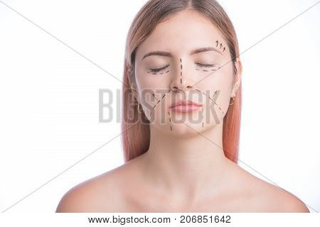 Beautiful girl white studio background perforation lines on face