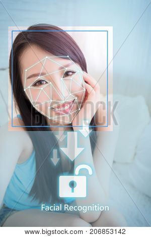 young woman is taking selfie for facial recognition concept