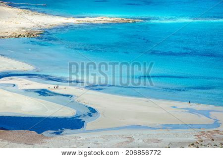 Amazing view of Balos Lagoon with magical turquoise waters, lagoons, tropical beaches of pure white sand and Gramvousa island on Crete, Greece