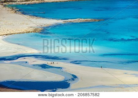 Amazing view of Balos Lagoon with magical turquoise waters, lagoons, tropical beaches of pure white sand and Gramvousa island on Crete, Greece
