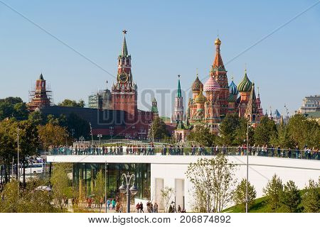 Moscow, Russia - September 23. 2017. Tourists are walking on observation deck in a new park Zaryadye.