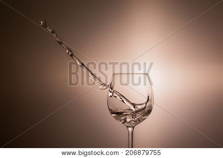 Moving White Wine Glass Over On Sepia Wallpaper