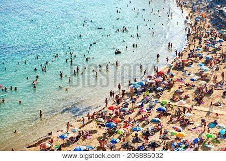 Torrevieja Spain - July 10 2017: Coastline of Playa del Cura in Torrevieja city at summertime. Costa Blanca. Spain