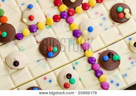 still life of white chocolate with smarties