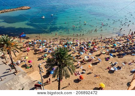 Torrevieja Spain - July 10 2017: Coastline of Playa del Cura in Torrevieja city at summertime. Costa Blanca. Spain