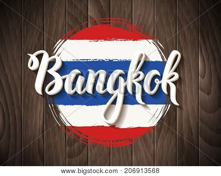 Bangkok vector lettering and thai national flag on vintage wooden background. Bangkok city hand drawn typography. Vintage calligraphy design
