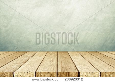 Empty perspective wood and green cement wall background room table top shelf for product display montage background mock up vintage style