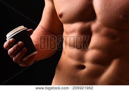 Athletes Body In Close Up, Hand Holding Coffee Cup