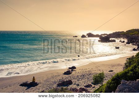 Tropical sandy beach of Ligres, Crete, Greece, with big waves.