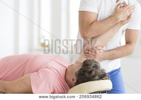 Patient Having Her Hand Stretched
