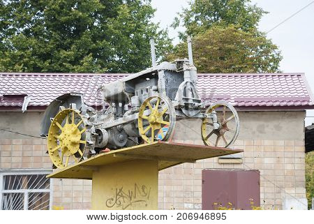Konotop UKRAINE -August 15 2013:Tractor Universal-2 on a pedestal.City Konotop Sumy region Ukraine