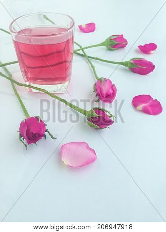 Beautiful pink rose and sweet drink for relax