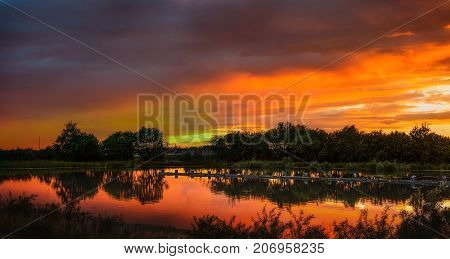 beautiful evening sunset over small lake in russia