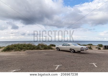 Tisvilde, Denmark - September 16, 2017: A Chevrolet oldtimer standing on the parking lot at Tisvilde beach