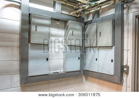 Metal Electricity Control Box With Sign On The Wall