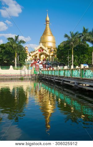 Yangon, Myanmar - December 18, 2016: View Of The Buddhist Temple Of The Maha Wizaya Pagoda On A Sunn