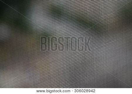 Texture. Metal Fine Mesh With Gray Gradient Defocusing.