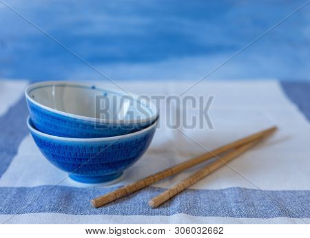 Basmati Rice With Vegetables With Chopsticks  Chinese Concept On Blue Freshie Background