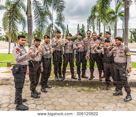 Makassar, Sulawesi, Indonesia - February 28, 2019: Closeup Of Group Of Strong Police Men Of Sabhara 