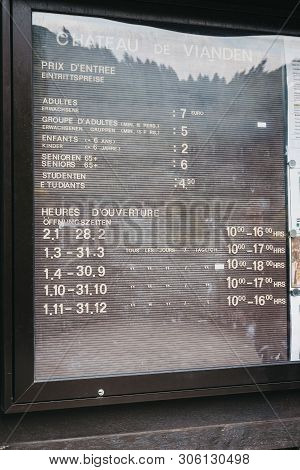 Vianden, Luxembourg - May 18, 2019: Opening Hours And Admission Fees Board Outside Vianden Castle, L