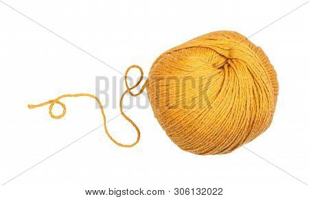 Skein Of Yellow Yarn With Unwound Tail Isolated On White Background