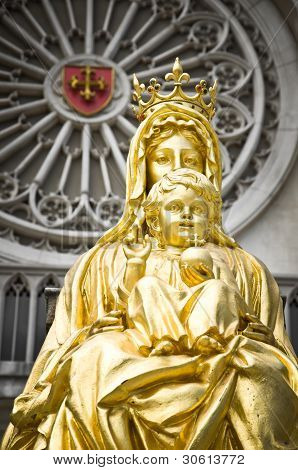 Golden baby Jesus and mother Mary
