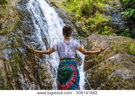 Asian Women Relax In The Holiday. Play If Yoga.  Play If Yoga At Waterfall On The Moutain. Exercise,