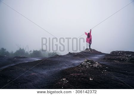 Tourist With Pink Rain Coat Stand View The Scenery Natural Beautiful Touch Fog At Phu Hin Rong Kla N
