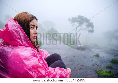 Tourist With Pink Rain Coat Stand View The Scenery Natural Beautiful Touch Fog At Phu Hin Rong Kla N