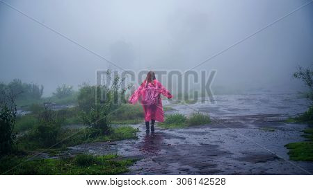 Tourist With Pink Rain Coat Stand View The Scenery Natural Beautiful Touch Fog At Phu Hin Rong Kla N