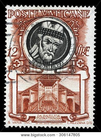 ZAGREB, CROATIA - JULY 03, 2014: A stamp issued in Vatican shows Pope Saint Sylvester I and Basilica Constantiana, circa 1953.