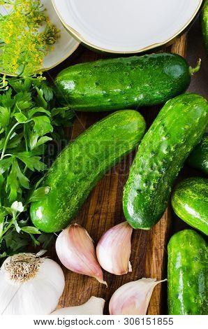 Conservation Of Fresh Green Cucumbers For The Winter. Preparation Marinated Salted Cucumbers With He