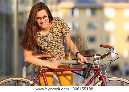 Girl With Bicycle  Lock. Bicycle U- Lock