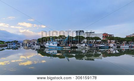 The Harbor In Caorle In The Evening