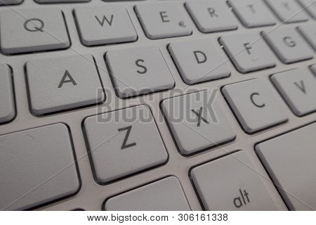 Close-up Detail Of A Qwerty Keyboard Of A Laptop Pc