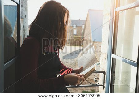 Girl Is Reading A Book