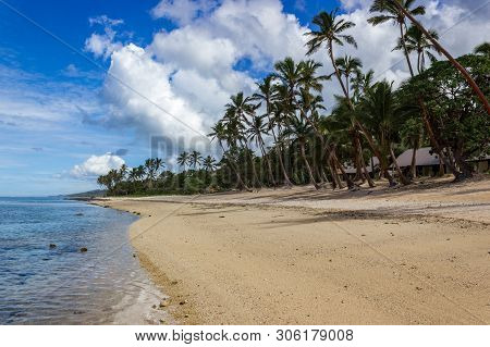 Beach On The Tropical Island Clear Blue Water. Dravuni Island, Fiji.
