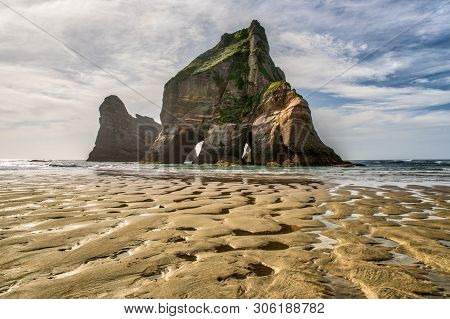 The Beautiful Rock Formats Off The Coast At Wharariki Beach